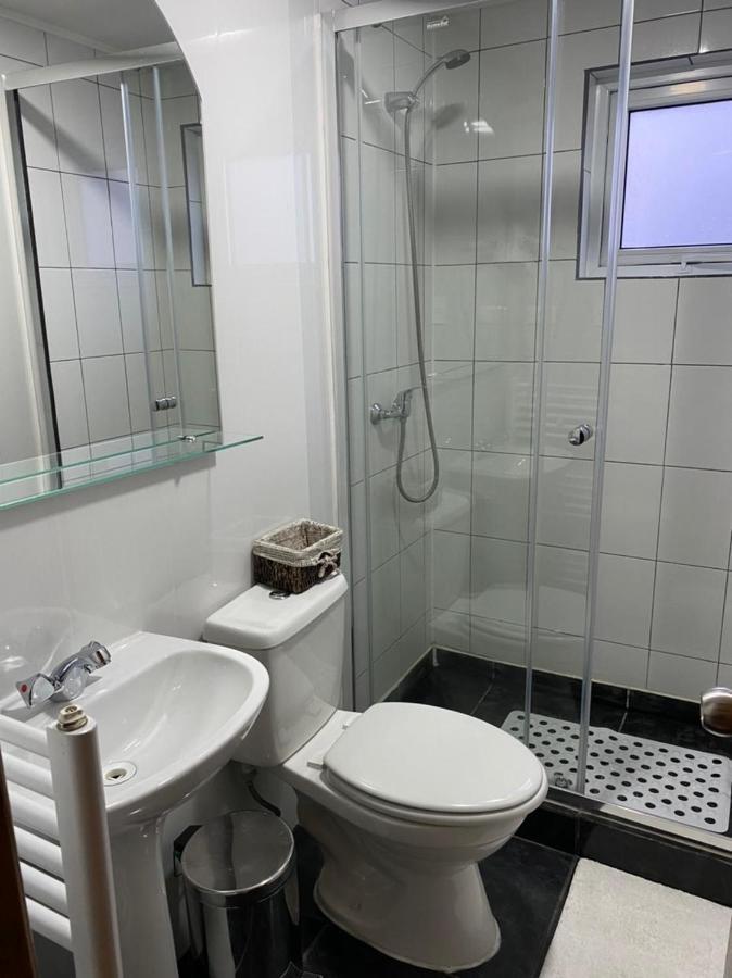 Hostal America En Puerto Natales Buitenkant foto