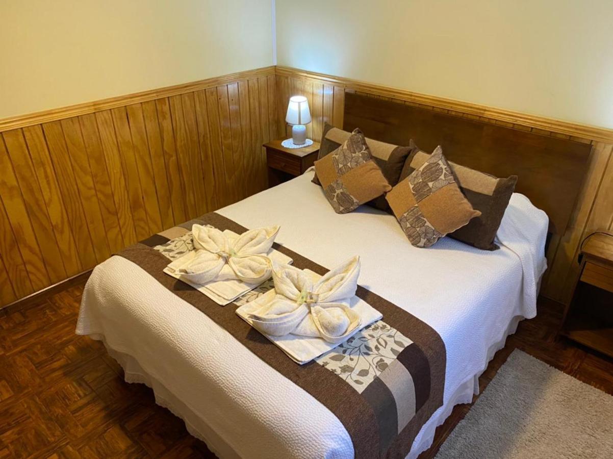 Hostal America En Puerto Natales Buitenkant foto